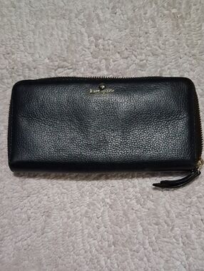 kate spade Black Zip-Around Leather Wallet with Gold Logo